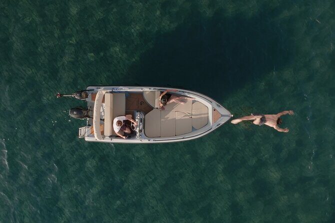 Santorini Rent a Boat - License free private cruise - Boat setup: the comfort details you’ll feel in your first 30 minutes