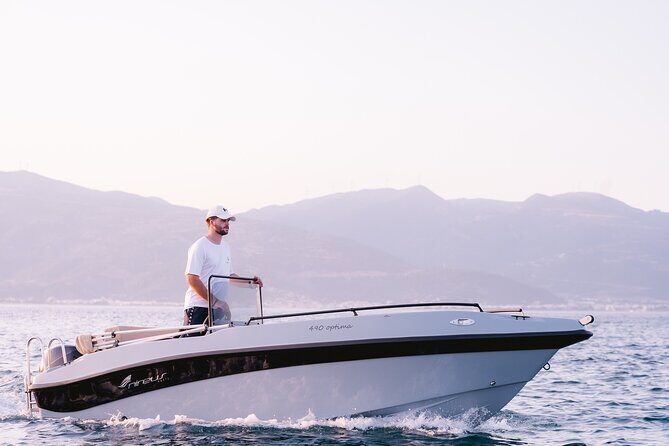 Santorini Rent a Boat - License free private cruise - Volcano vibes and the “why this coastline is hard to reach”
