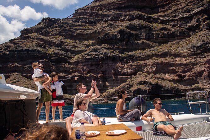 Santorini Sailing Catamaran Daily Cruises w/ Greek BBQ @Thirasia - Red Beach and Akrotiri’s Volcanic Colors in 20 Minutes
