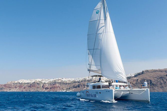 Santorini Small-Group Catamaran Sailing Trip(BBQ,drinks, transfer) - From Hotel Pickup to Marina: How the Day Flows