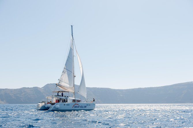 Santorini Small-Group Catamaran Sailing Trip(BBQ,drinks, transfer) - Ancient Lighthouse and Palea Kameni: Seeing the Caldera from a Different Angle