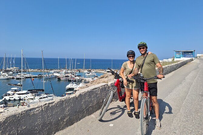 Santorini Small Group Guided E-bike Tour & Local Tomato Museum - Akrotiri’s Venetian Castle viewpoint is the caldera payoff
