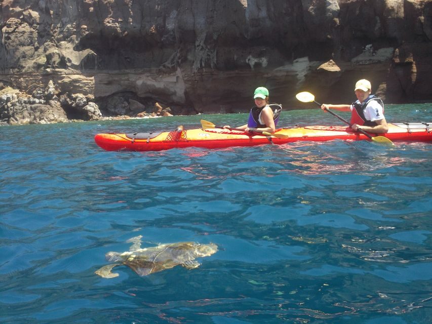 Santorini: South Sea Kayaking Tour with Sea Caves and Picnic - Santorini’s South Coast, Seen From the Water at Real Speed