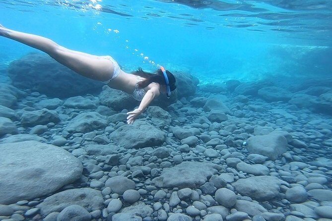 Santorini: Stand-Up Paddle and Snorkel Adventure - SUP lessons with real coastline views, not a classroom