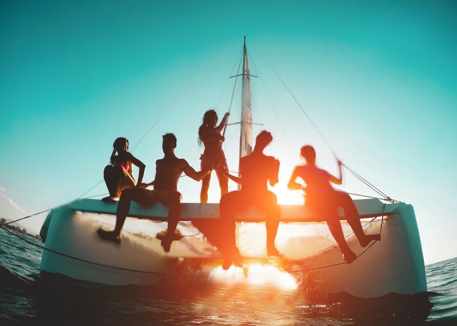 Santorini: Sunset Caldera Cruise with BBQ Meal and Drinks - Akrotiri to the Caldera Entrance: The Route That Sets the Mood