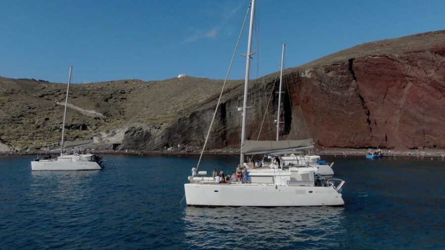 Santorini: Sunset Cruise with Greek Dinner and Transfer - Key Highlights You’ll Care About