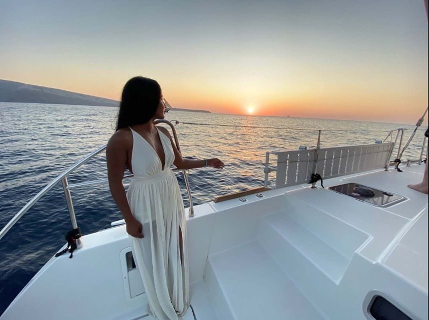 Santorini: Sunset Cruise with Greek Dinner and Transfer - Getting On Board: Transfers, Timing, and the Start of the Evening