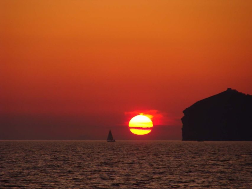 Santorini: Sunset Cruise with Greek Dinner and Transfer - Nea Kameni and Palea Kameni: Volcano Water and Warm-Springs Time