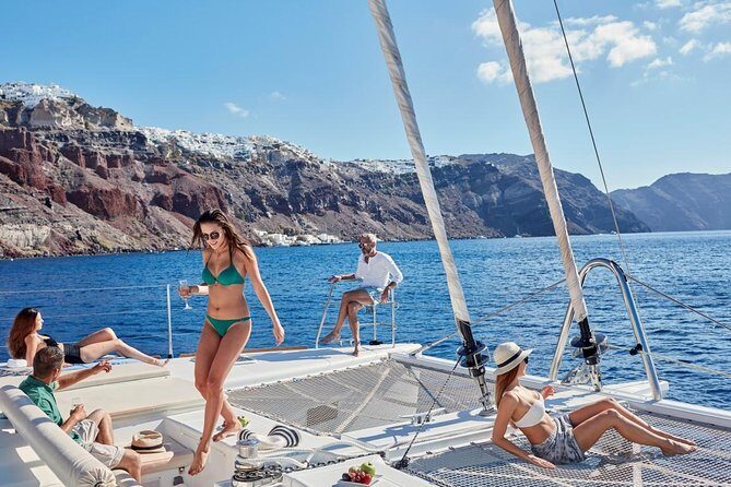 Santorini Sunset Luxury Sailing Catamaran Cruise with BBQ, drinks, transfer - What You’re Actually Buying on a Santorini Sunset Catamaran