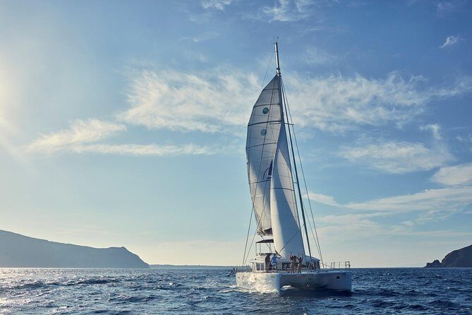 Santorini Sunset Luxury Sailing Catamaran Cruise with BBQ, drinks, transfer - Hot Springs: A Unique Swim With Clear Safety Notes