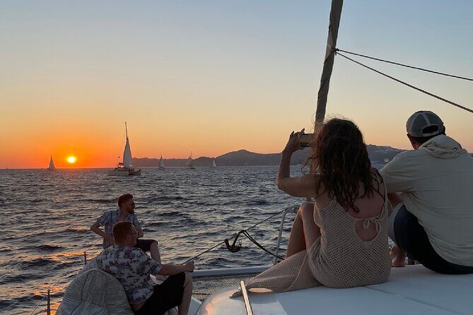 Santorini Sunset Sailing Cruise: Dinner, BBQ, Open Bar, Transfers - Key things that make this cruise worth your time