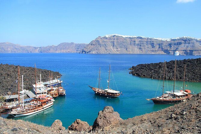 Santorini Sunset Sailing Cruise: Dinner, BBQ, Open Bar, Transfers - Mesa Pigadia Beach plus Greek dinner, BBQ, and open bar