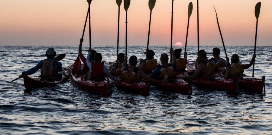 Santorini: Sunset Sea Kayak with Light Dinner - Launch at Mesa Pigadia: Black Beach, Real Volcanic Drama