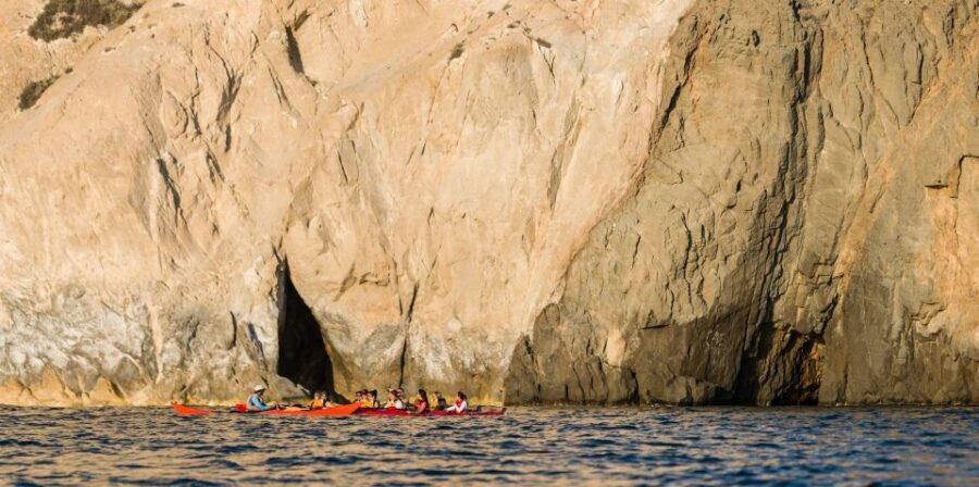 Santorini: Sunset Sea Kayak with Light Dinner - Dry Clothes, Traditional Dinner, and a Warm Finish