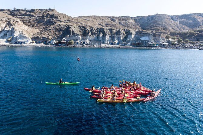 Santorini: Sunset Sea Kayak with Light Dinner with Pick-up Option - Mesa Pigadia Beach: Starting Calm Before the Scenic Work