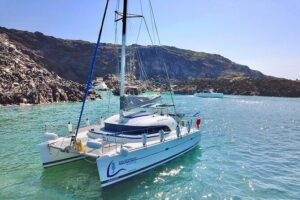 Santorini Sunset:Private All-In Catamaran Cruise (Food&Drinks) - The first swim break at Red Beach (optional, but worth planning for)