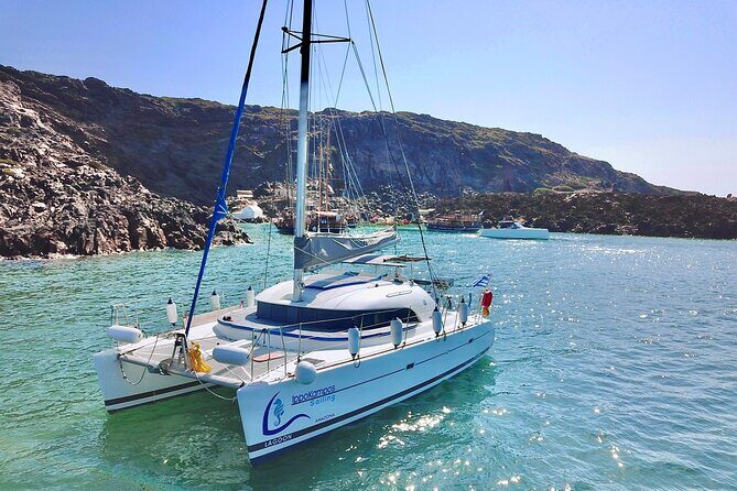Santorini Sunset:Private All-In Catamaran Cruise (Food&Drinks) - The first swim break at Red Beach (optional, but worth planning for)