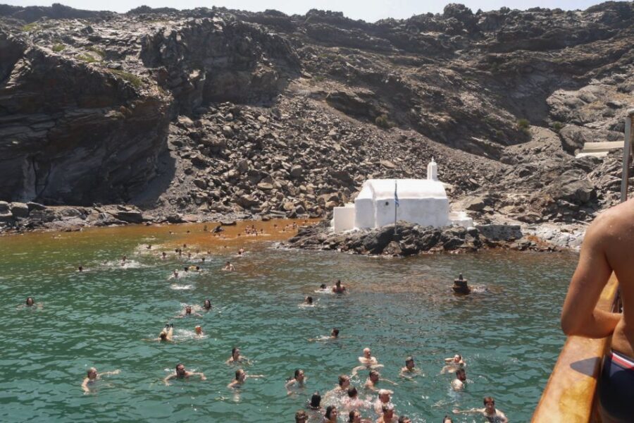 Santorini: Volcanic Sunset Cruise with Dinner - A Traditional Caique at Athinios Port: The Start Sets the Tone