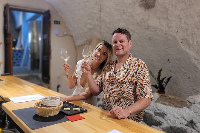 Santorini Volcanic Wine Tour – Private Tasting with Local Expert - Stop 1 in Fira: volcanic vineyards and the kouloura vine shape