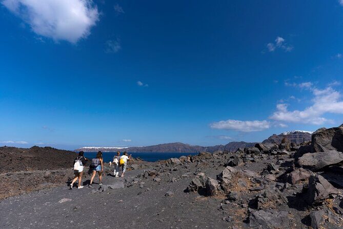 Santorini - Volcano and Hot springs - Stop 2: Palaia Kameni hot springs at St. Nicholas Bay (30–35°C)