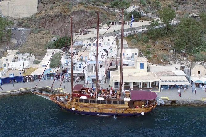 Santorini Volcano Half Day Tour - Palea Kameni hot springs: mud water, sulfur, and real swim skill