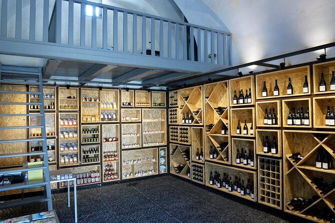 Santorini Wine Tasting and Sunset Getaway Small Group Tour - Stop 3: Venetsanos Winery cliffs, volcanic views, and your final pours