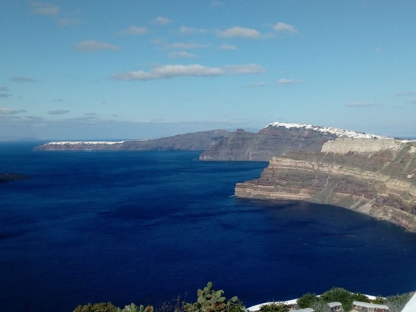 Santorini: Wine Tasting Tour & Sunset Viewing - The third winery, cellar tours, and the sunset plan on caldera cliffs