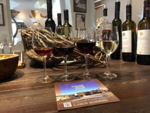 Santorini: Wine Tour with Sunset in Oia - Mesa Gonia Wine Museum: walking a cave meant for winemaking memory