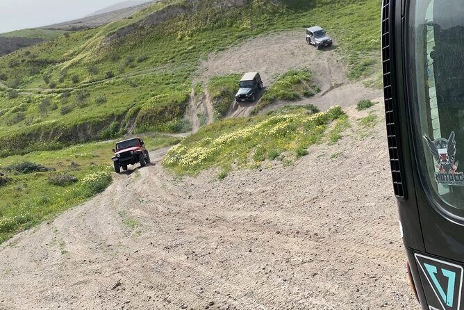 Santorini Wrangler Jeep Afternoon Convoy Tour - Windmills of Emporio: a quick scenic reset with 15 minutes on the clock