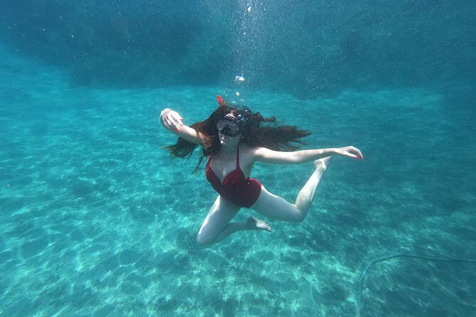 Small-Group Santorini Sea Caves Kayak Trip with Snorkeling & Picnic - Sea Caves, White Beach Cliff Jumps, and That Blue-Water Look