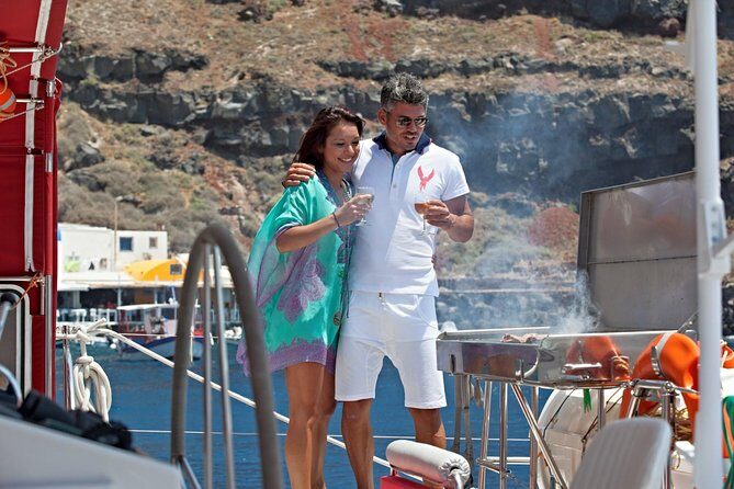 Sunset Sailing Catamaran Cruise in Santorini with BBQ and Drinks - From Ammoudi or Athinios to a Volcano-First Sail